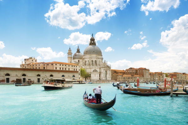 Grand Canal and Basilica Santa Maria della Salute, Venice, Italy and sunny day Venedig im Nachtzug